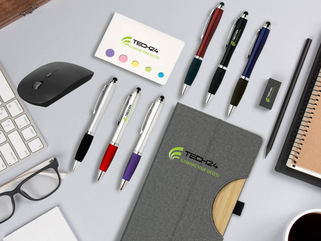 Office onboarding kits featuring branded notebooks, reusable coffee cups, and wireless chargers to boost morale and productivity during the return to work.